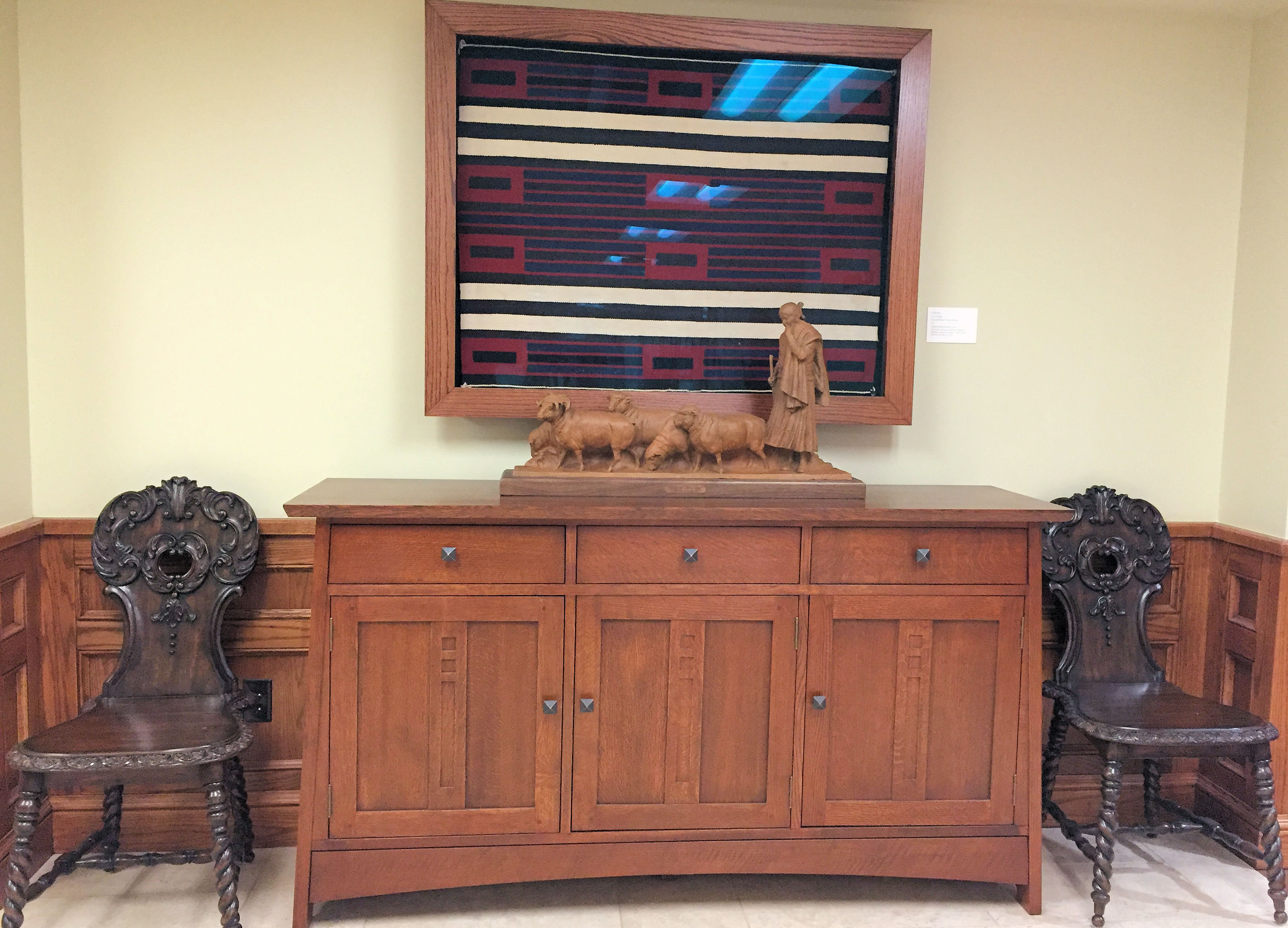 cabinet, chairs, sculpture