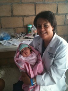 Dr. Aletha Oglesby with baby patient