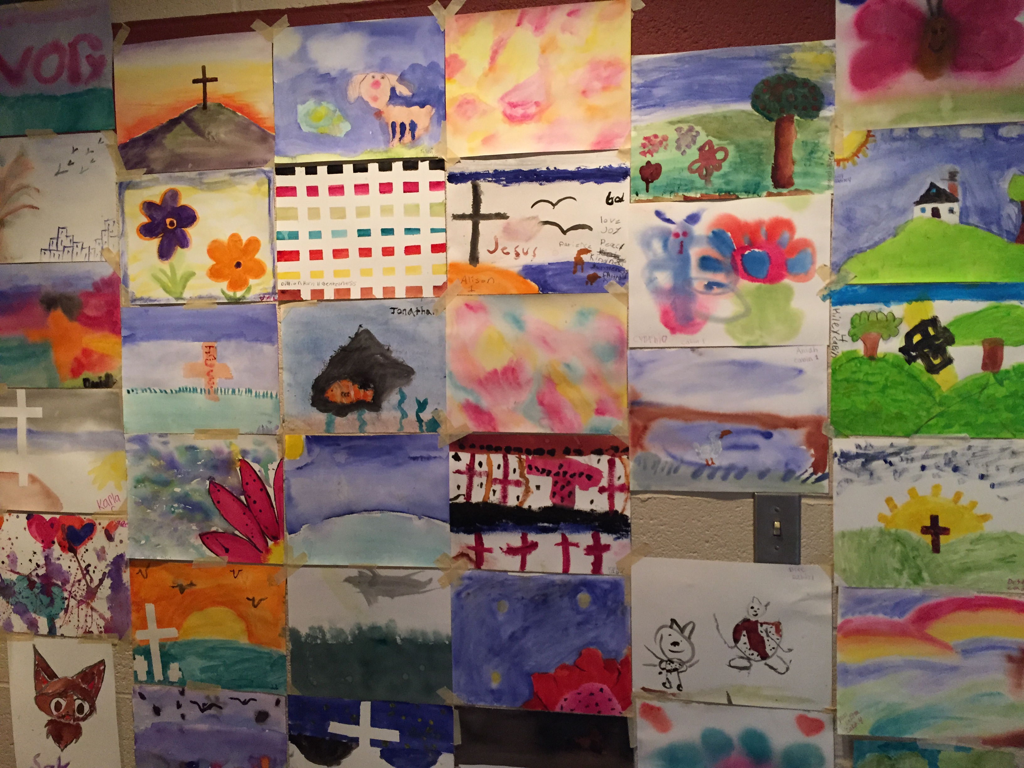 simple children's paintings on a wall