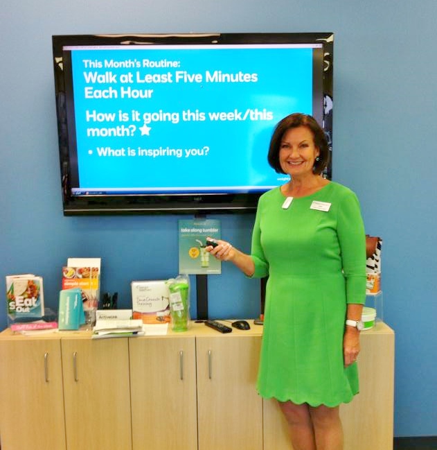 Pam leading a Weight Watchers meeting