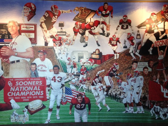 a mural with football team of the University of Oklahoma