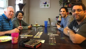 family playing a card game 