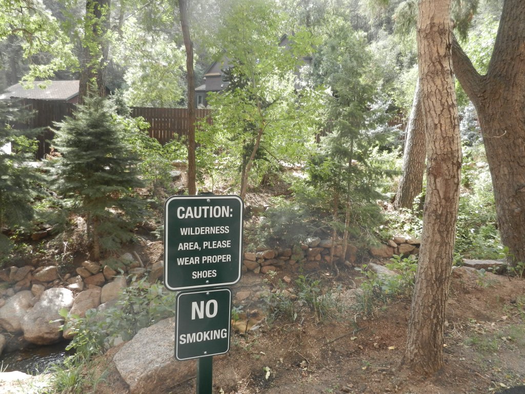 sign says NO smoking, wilderness area