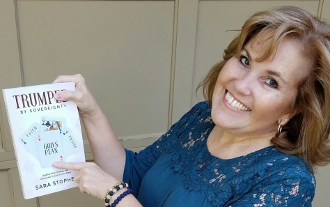 Sara Stophel with her book, Trumped By Sovereignty