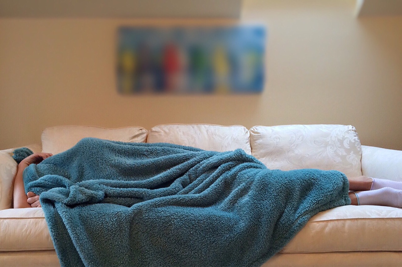 person sleeping on a couch