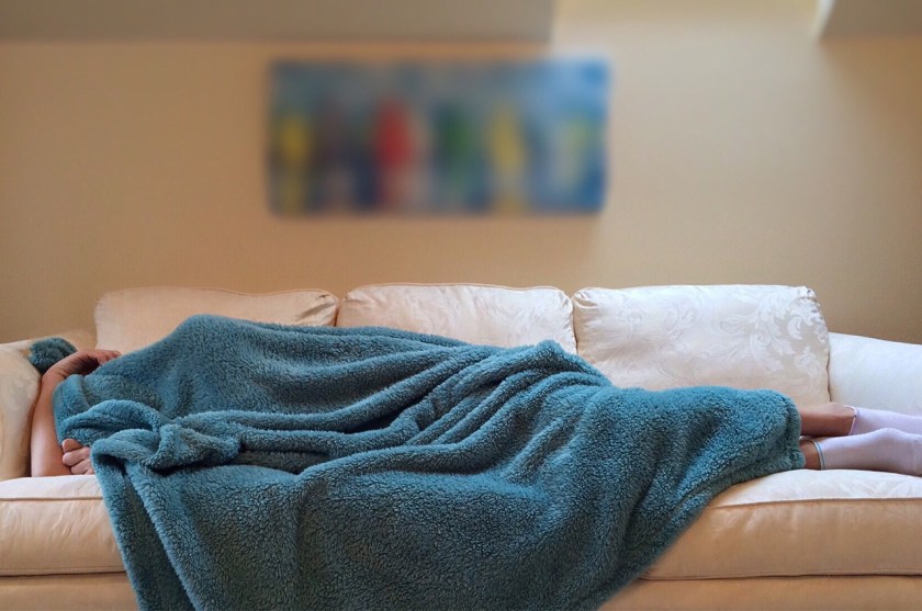person sleeping on a couch