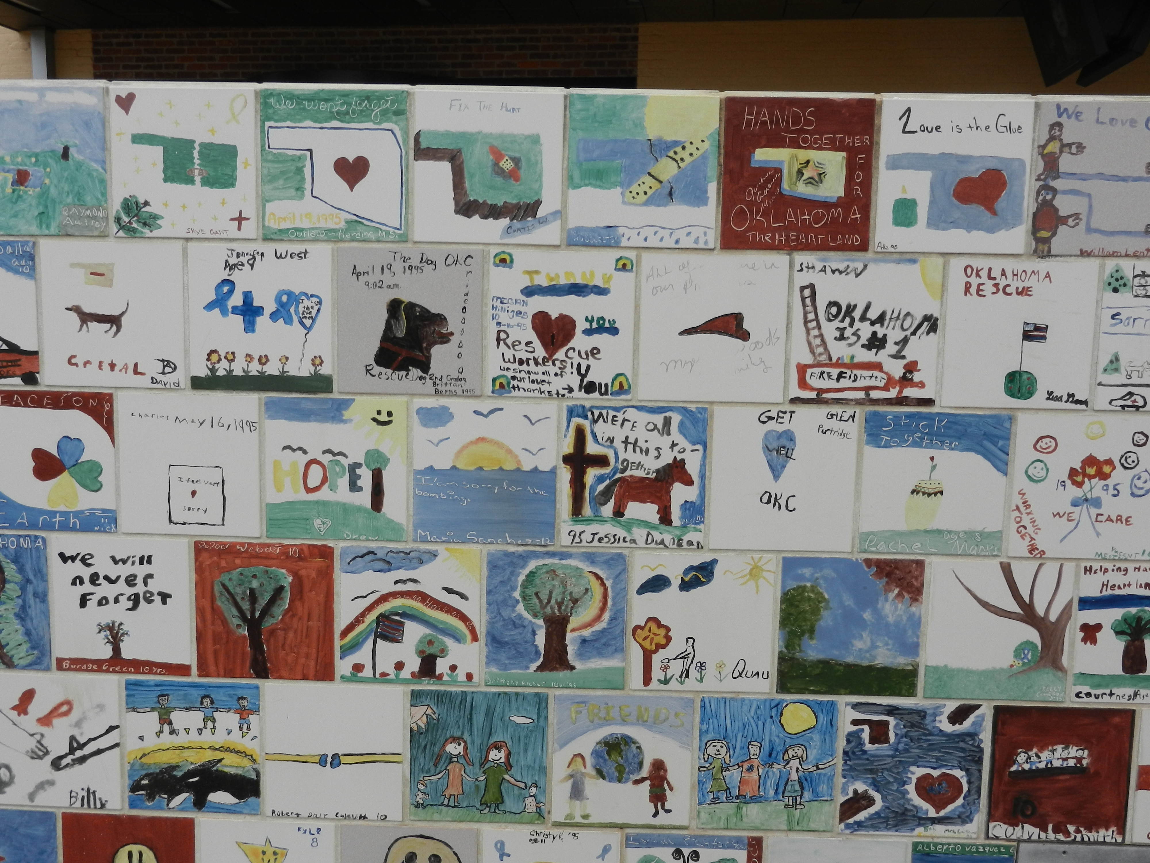 colorful painted tiles displayed on wall