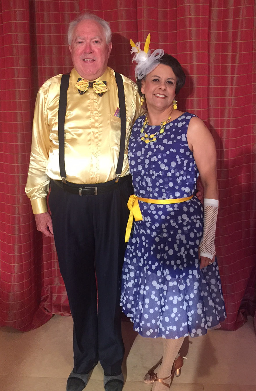 man and lady dressed in dance costumes