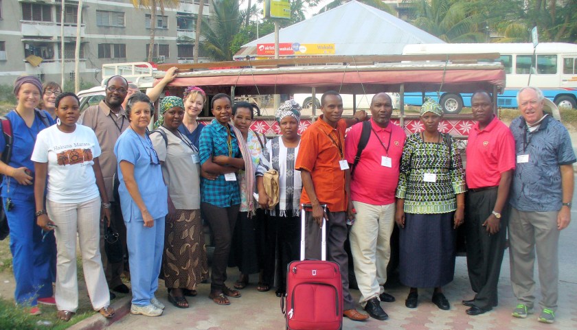 group of people, some in African garb