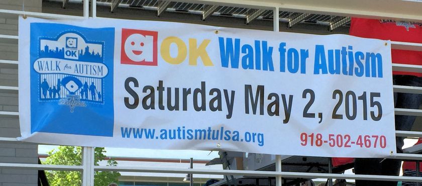 a banner reading "aok Walk for Autism"