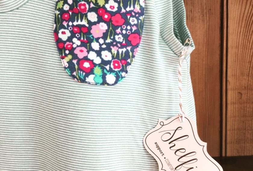 a shirt with a tag-shelfie