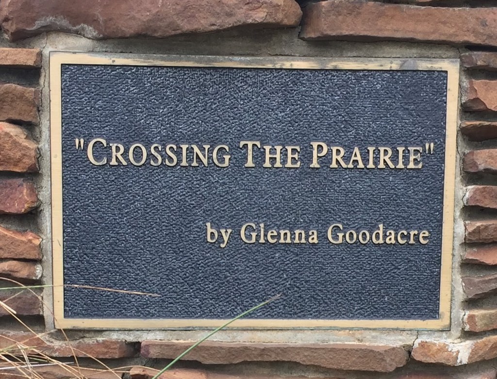sign-Crossing The Prairie by Glenna Goodacre