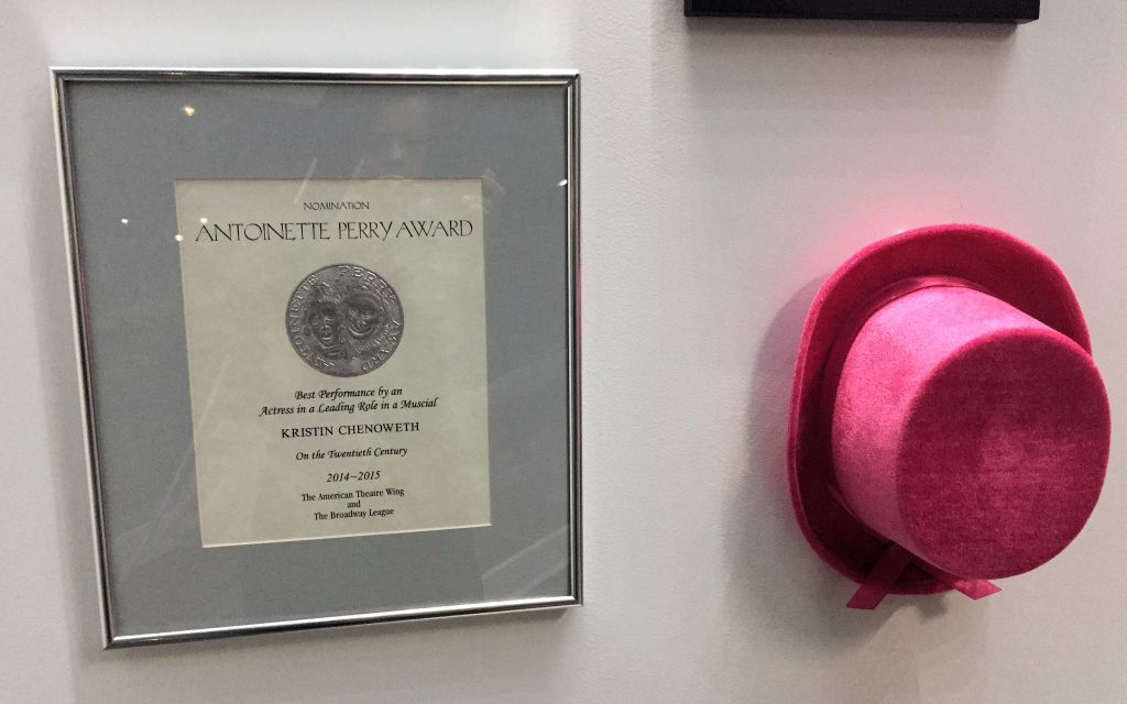 Kristen Chenoweth's Antoinette Perry Award and pink hat.