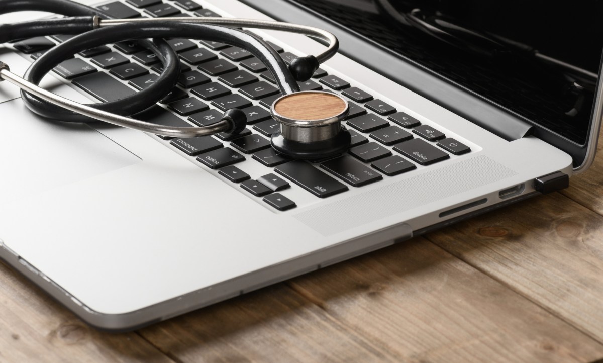 Stethoscope on the keyboard of a laptop