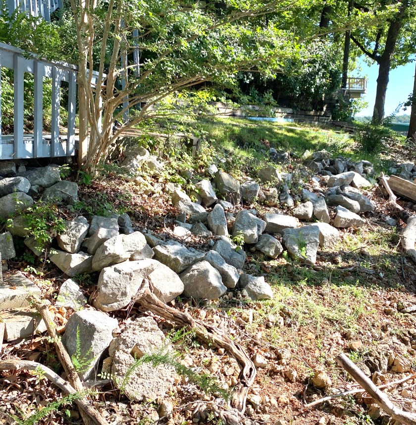 big rocks on a grassy slope