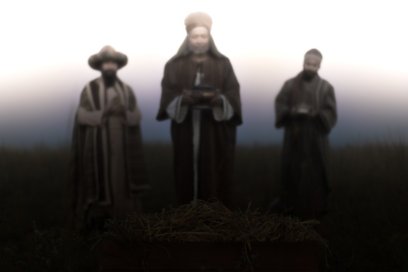 3 men dressed as magi, bearing gifts
