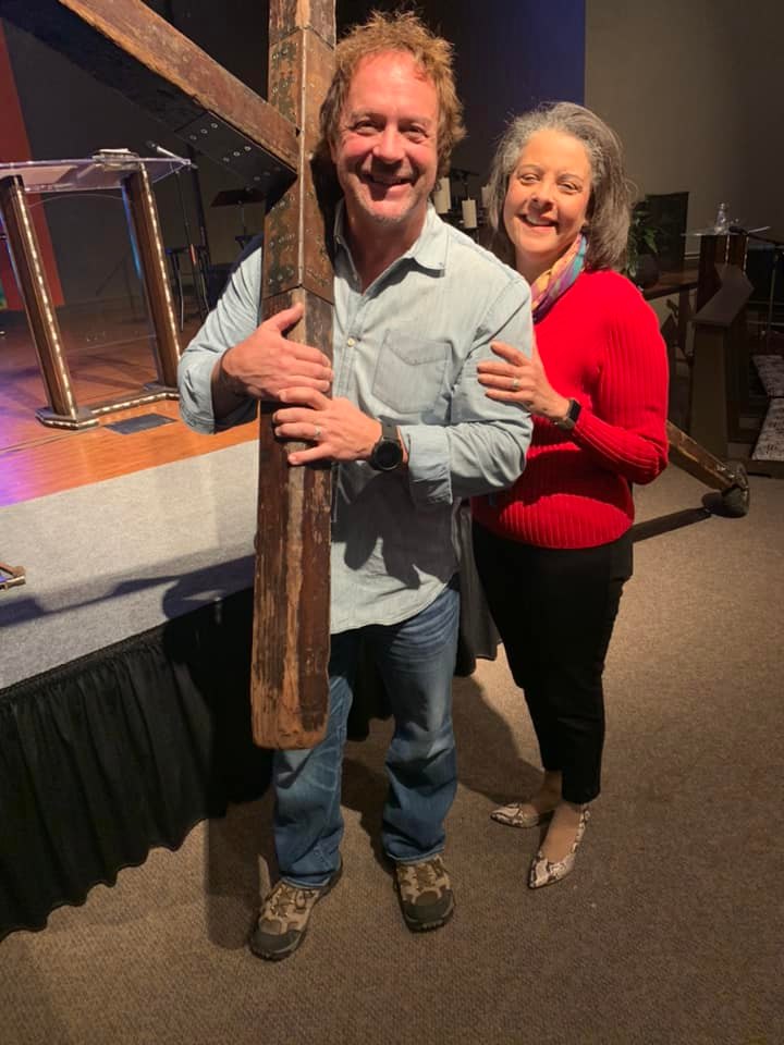 Keith Wheeler holding his cross with Dr. Aletha